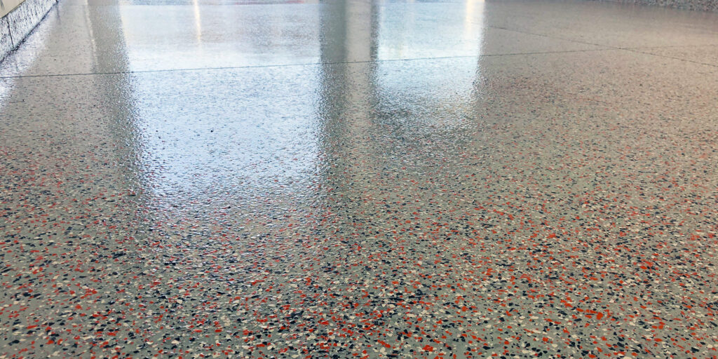 Decorative flake polyurea garage coating for a clean Michigan garage