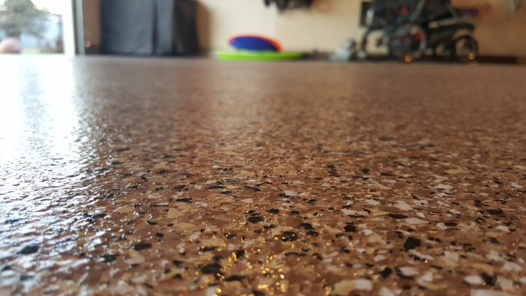 Polyurea garage floor coating with decorative flake finish in Rochester Hills MI